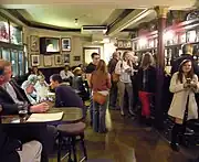 The bar, showing some of the memorabilia on display, including the head of the Hound of the Baskervilles