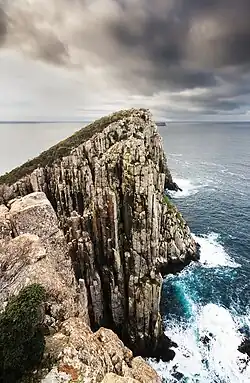 The Totem Pole, Cape Hauy on the Tasman Peninsula. The Lanterns and the Hippolyte Rocks are visible behind.