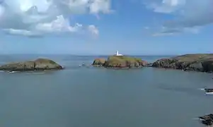 Strumble Head lighthouse, looking across Carreg Onnen Bay