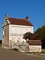 old house in front of the lavoir