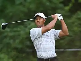 Tiger Woods, champion of the 2000 Canadian Open and winner of the Triple Crown along with Lee Trevino (1971).