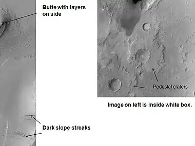 Tikonravev Crater floor, as seen by Mars Global Surveyor. Click on image to see dark slope streaks and layers.  Tikonravev Crater is in the Arabia quadrangle.