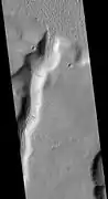 Tinia Valles, as seen by HiRISE. Full size image shows dark slope streaks.