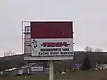 TIOGA Motorsports Park sign.