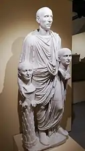 The so-called "Togatus Barberini", a statue depicting a Roman senator holding portrait effigies (possibly imagines) of deceased ancestors; marble, late 1st century BC; head (not belonging): mid 1st century BC.