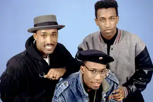 Tony! Toni! Toné! photographed in 1988  D'Wayne Wiggins (left), Timothy Christian Riley (top right), and Raphael Saadiq (bottom)