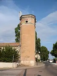 The tower of the FORTEF (Forces et Terres du Fium'orbu) of Migliacciaru, housing a clock and a siren to inform workers of the time, in Prunelli-di-Fiumorbo