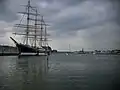 River Trave with the tall sailing ship Passat and the town skyline