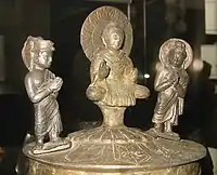 The Kushan Kanishka casket of 127, with (left to right) Brahma, the Buddha and Indra