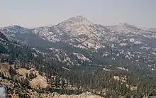 Aerial photo of Trinity Mountain surrounded in smoke