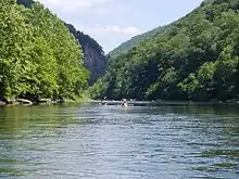 Kayakers Paddling The Trough