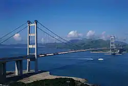 A large concrete suspension bridge.