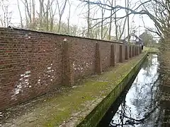 Brick wall, paving and canal wall in Wassenaar, Netherlands