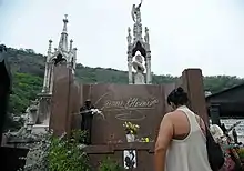 Miranda's grave, with her autograph on an elaborate tombstone