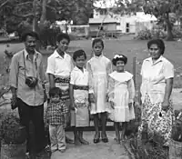 Young boys wearing traditional Tongan Tupenu