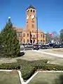 A view of the Macon County Courthouse from the park in the town square                                                                                         The Main Street Historic District was added to the National Register of Historic Places on March 12, 1984.