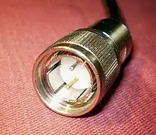 Twinaxial cable connector,  a male plug