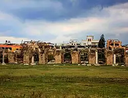 Remains of a Roman aquaeduct in El Buss with the camp in the background