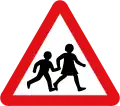 UK road sign warning of schoolchildren, one of the pictographic signs designed by Calvert ahead of the 1963 Worboys Review