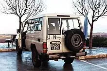 A UN Toyota Land Cruiser parked near Majdal Shams displaying UNDOF plates and a UN flag, January 2012.