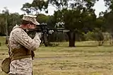 M9 bayonet-fitted M4 carbine firing during secondary target drills.