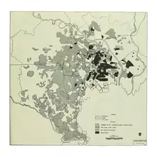 Black and white map of Tokyo shaded with the areas of the city which were destroyed in different air raids