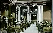 Drawing of students studying in an old library with columns