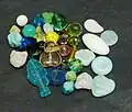 Modern uranium glass beads (black background)