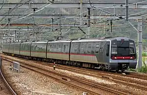 A Tung Chung line K-train approaching Sunny Bay station, bound for Hong Kong