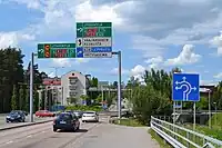 A Finnish road signs detailing directions at Vaajakoski's roundabout in Jyväskylä, Finland