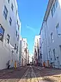 Alleyway behind building looking south