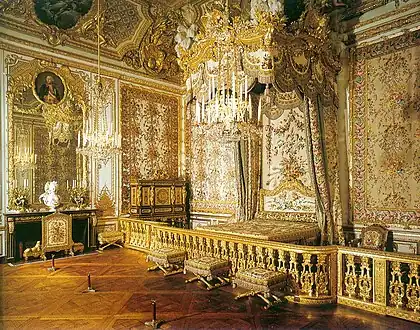 At Versailles, the Chambre de la Reine features the centrally-placed state bed delivered for Queen Maria Leszczinska.