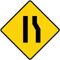 Road narrows on right side