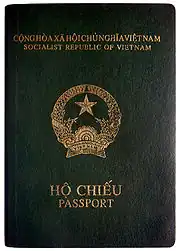 Vietnamese passport with green cover issued before 2022.