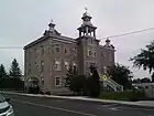 Built in 1912, Vieux Collège Saint-Jacques is on the Canadian Register of Historic Places.