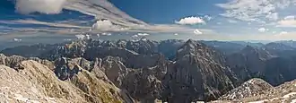 View from Mangart toward east (from left to right: Ponca, Špik, Mojstrovka, Škrlatica, Razor, Prisojnik, Travnik, Triglav, Kanjavec, Jalovec, Lepo Špičje