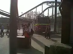 A partially submerged fire engine in the area surrounding the ride