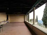 The original entrance leads into the loggia above the villino