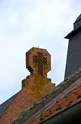 A cross on the church in Villers-lès-Roye