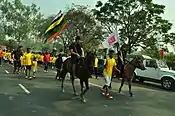 Horse Riders leading the way to the Kangla Fort while a Meitei holds the torch to inaugurate the sports festival on the first day of Yaosang.