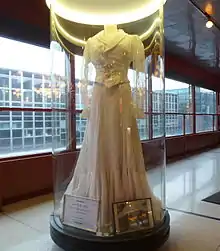 Long, white dress in a museum