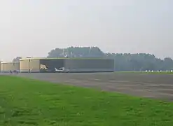 Round concrete hangars at Grimbergen Airfield, Belgium.