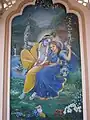 Wall art of Radha Krishna on swing inside the temple