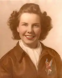 Portrait of Dorothy Olsen wearing a World-War II style bomber jacket.