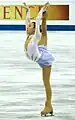 Cross-grab one-hand Biellmann spiral(Mao Asada)