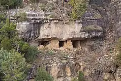 Stone structure on side of rockface