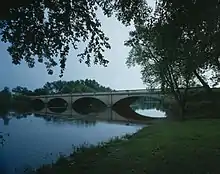 A bridge crossing a small river