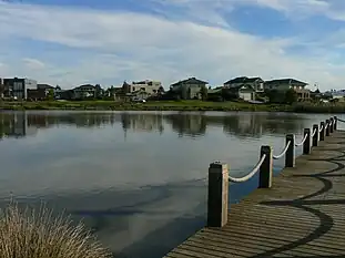 Lakeside residence, viewed across the lake from the main pier