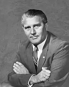 Wernher von Braun, who co-developed the V-2 rocket, the first artificial object to travel into space. Described by others as the "father of space travel", the "father of rocket science", or the "father of the American lunar program".