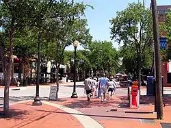 Tourists in the West End stroll down Market Street